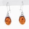 Cognac Amber Dangling Earrings Set In Sterling Silver