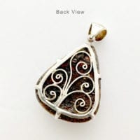 Hand-Crafted Cherry Amber Set In Sterling Silver Pendant