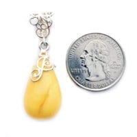 Hand-Crafted Butterscotch Amber Set In Sterling Silver Pendant