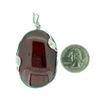 Hand-Crafted Cherry Amber Set In Sterling Silver Pendant