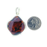 Hand-Crafted Cherry Amber Set In Sterling Silver Pendant