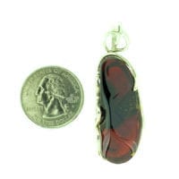 Hand-Crafted Cherry Amber Set In Sterling Silver Pendant