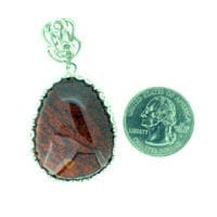 Hand-Crafted Cherry Amber Set In Sterling Silver Pendant