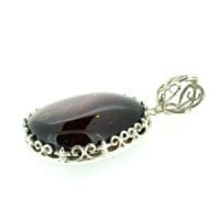 Hand-Crafted Cherry Amber Set In Sterling Silver Pendant