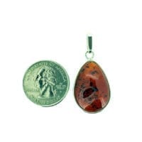 Hand-Crafted Cherry Amber Set In Sterling Silver Pendant