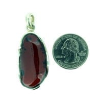 Hand-Crafted Cherry Amber Set In Sterling Silver Pendant