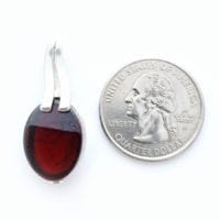Fancy Flat-Cut Cherry Amber Set In Sterling Silver Pendant