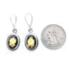 Elegant Hand-Crafted Amber Cameo Dangling Earrings - Image 3