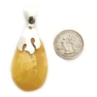 Hand-Crafted Butterscotch Amber Set In Sterling Silver Pendant